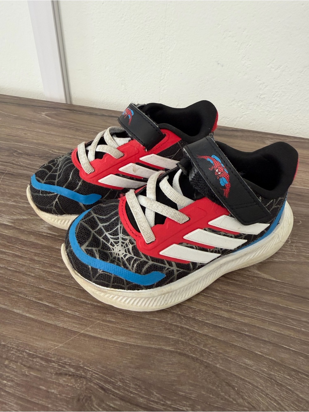 adidas Kids Black Spider-Web Sneakers with Red and Blue Accents
